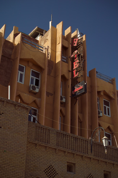 Late 20th and early 21st century architecture rising above the brickwork.